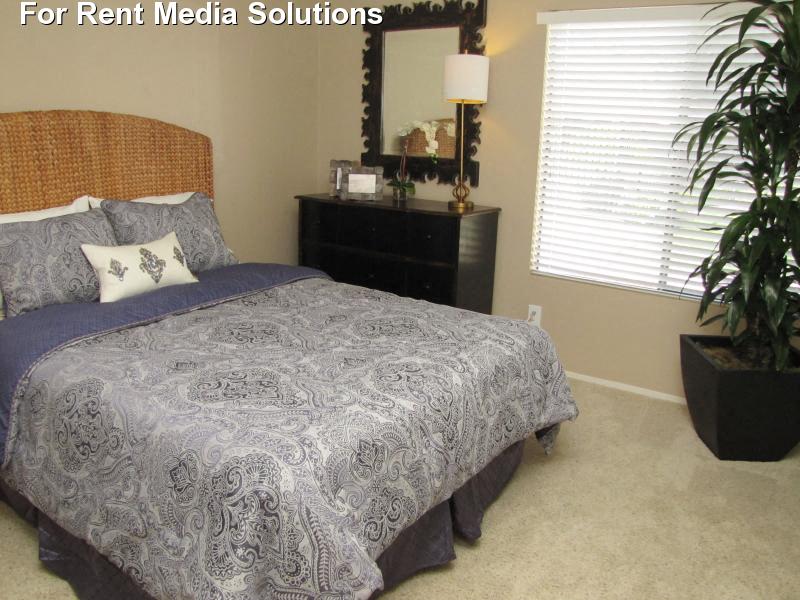 The Marina in Modesto bedroom with carpeting