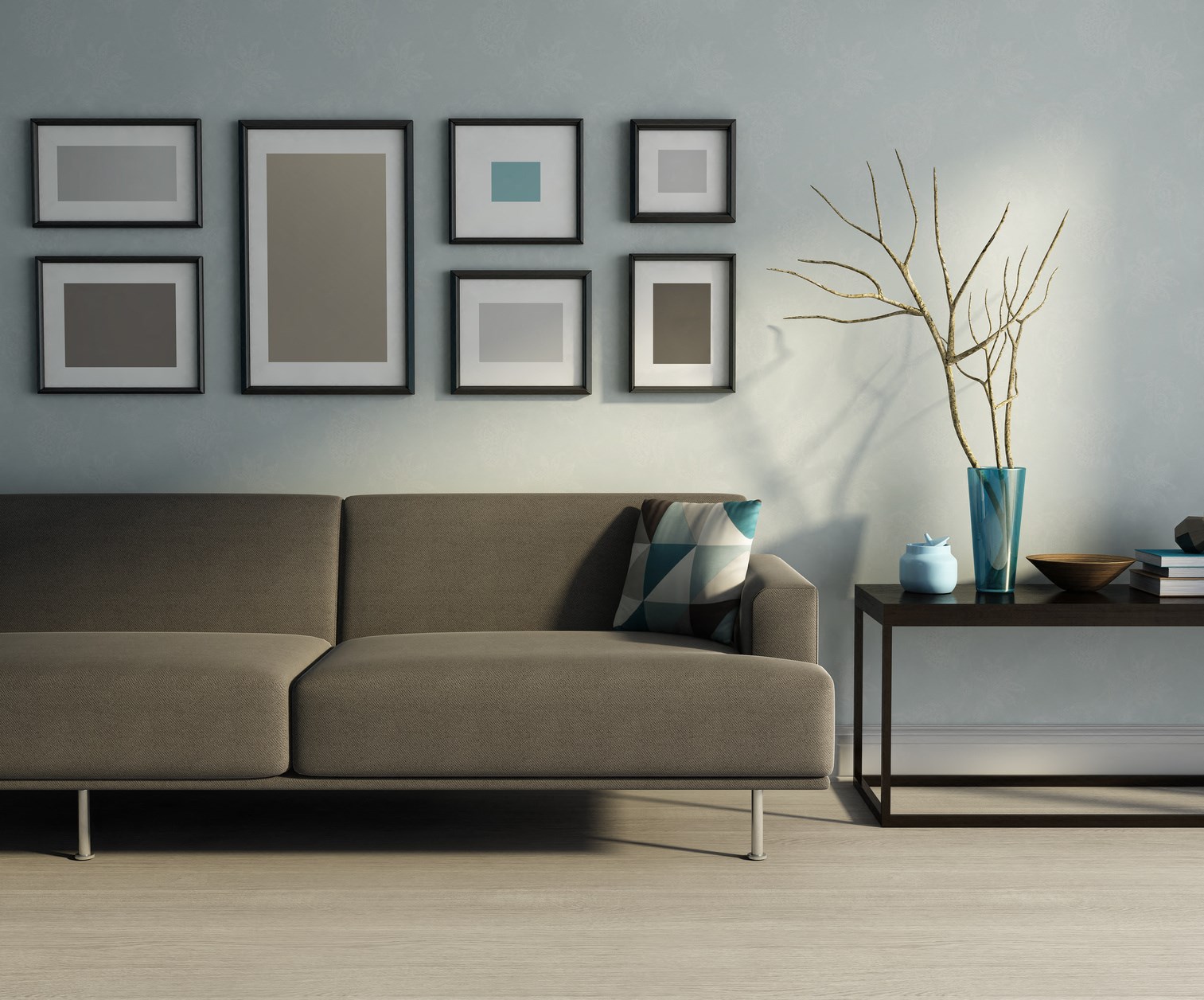 Furnished model of living room with grey wall and wood flooring