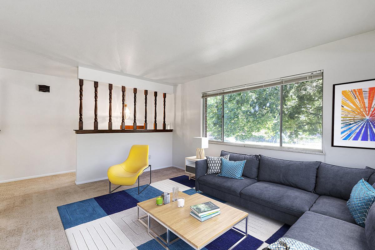 a living room with a couch and a coffee table