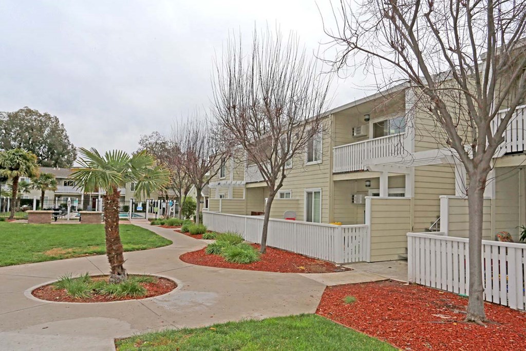 Exterior building view with landscape at PARKSIDE BRENTWOOD, California