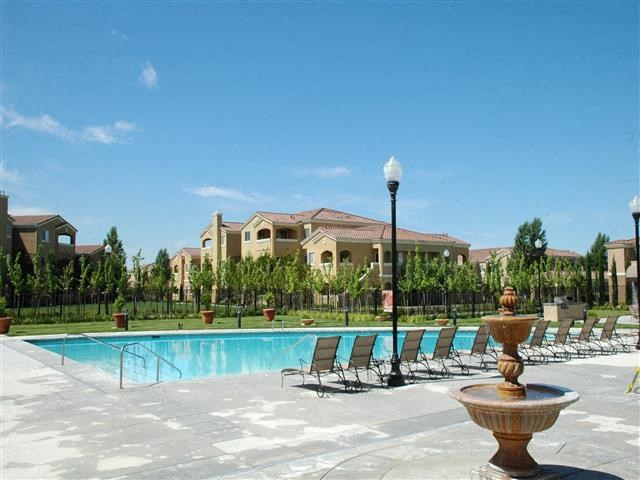 Pool with lounge chairs Siena Villas Apts for rent in Elk Grove Ca