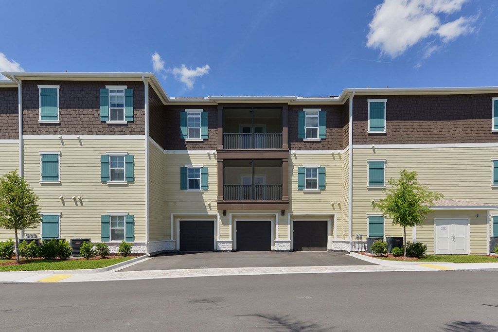 Apartment building with a clear blue sky above at Cabana Club Apartments, Jacksonville