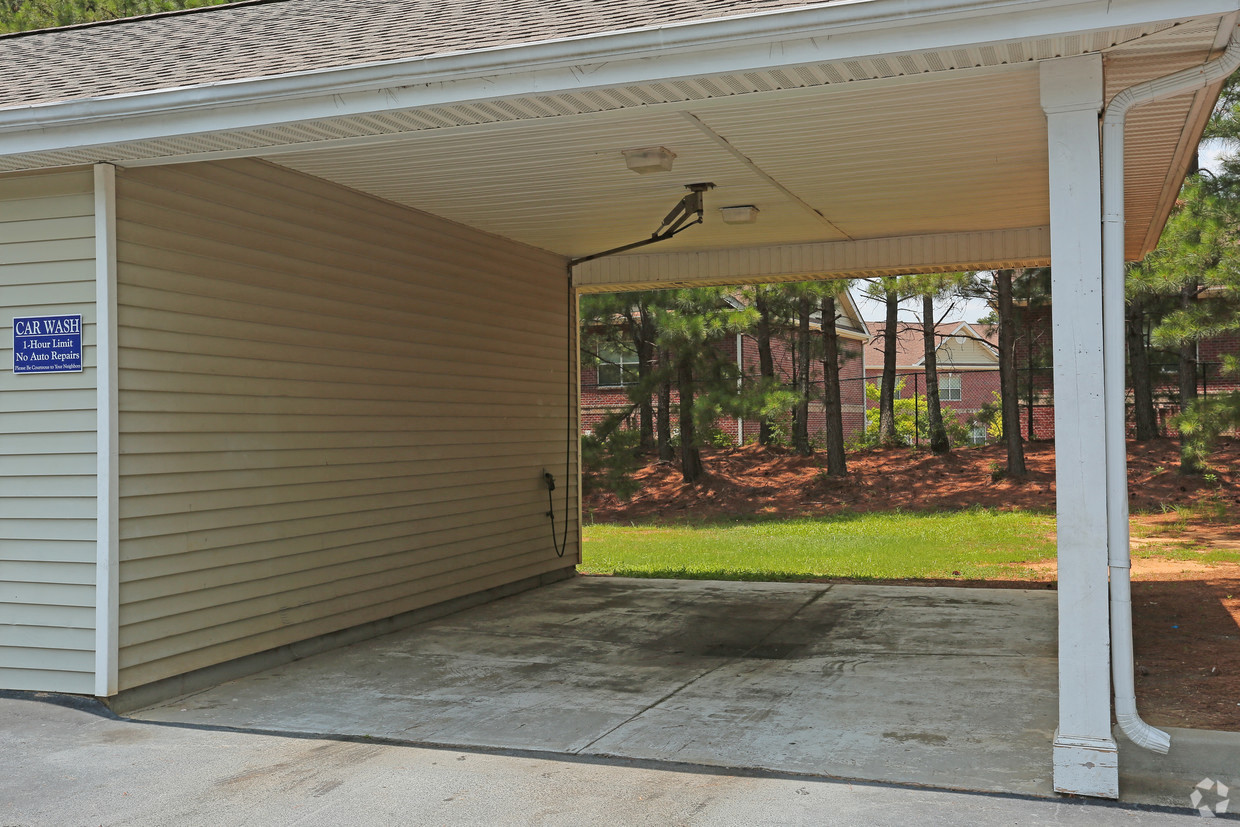 the front door of a house with a porch