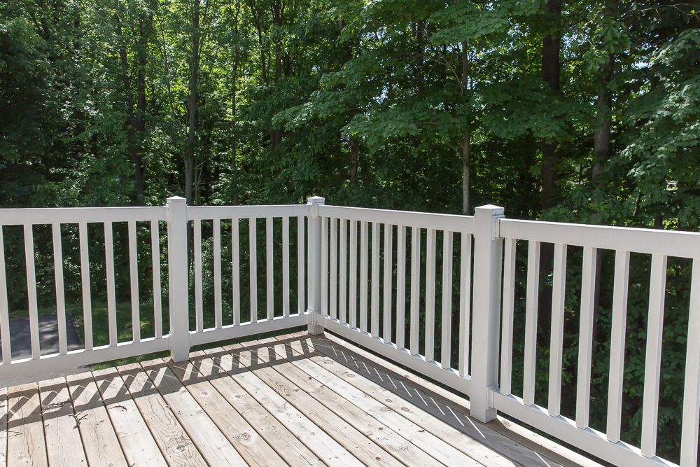 the deck has a view of the trees