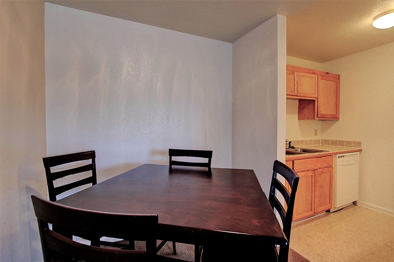 Image of dining room with table and chairs