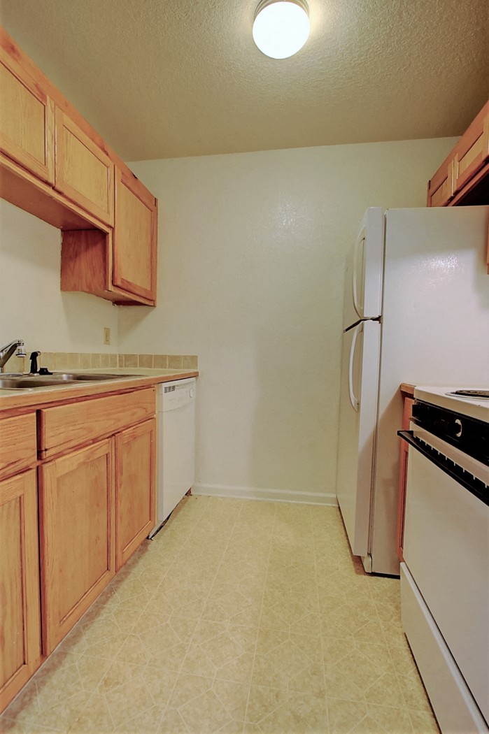 Image of kitchen with cabinets and appliances