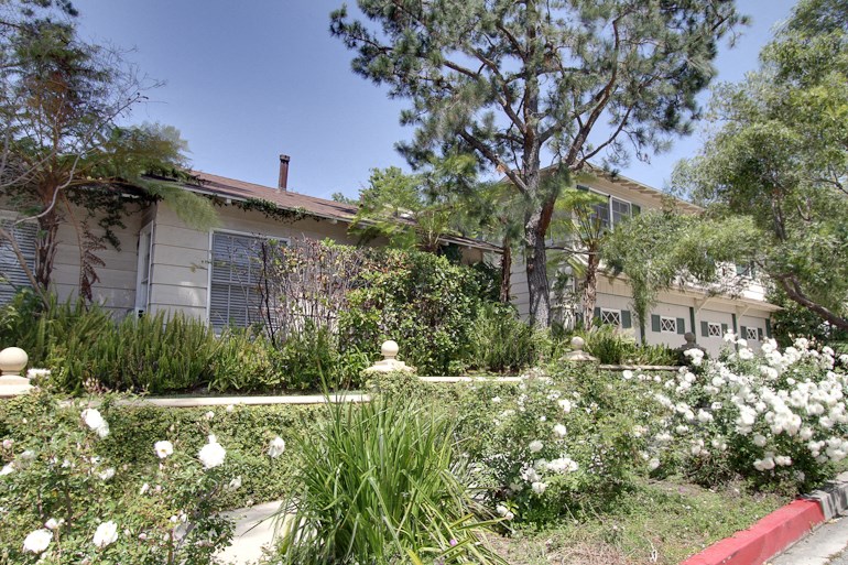 a house with a garden in front of it