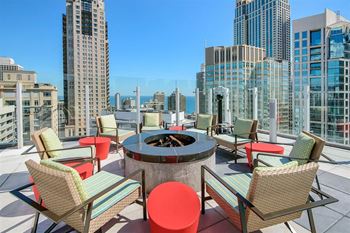 Outdoor Fire Pit Area at State & Chestnut Apartments, 845 N State St, Chicago