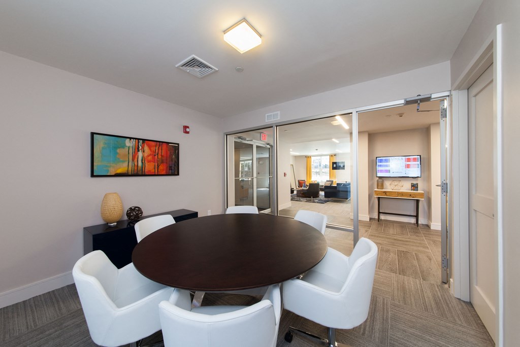 Resident Common Area Bright common area with round dining table and contemporary decor