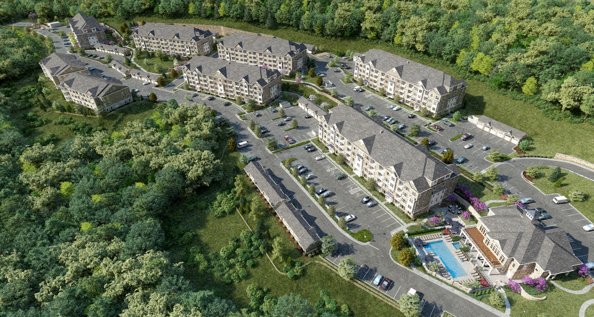 an aerial view of the hotel and apartments