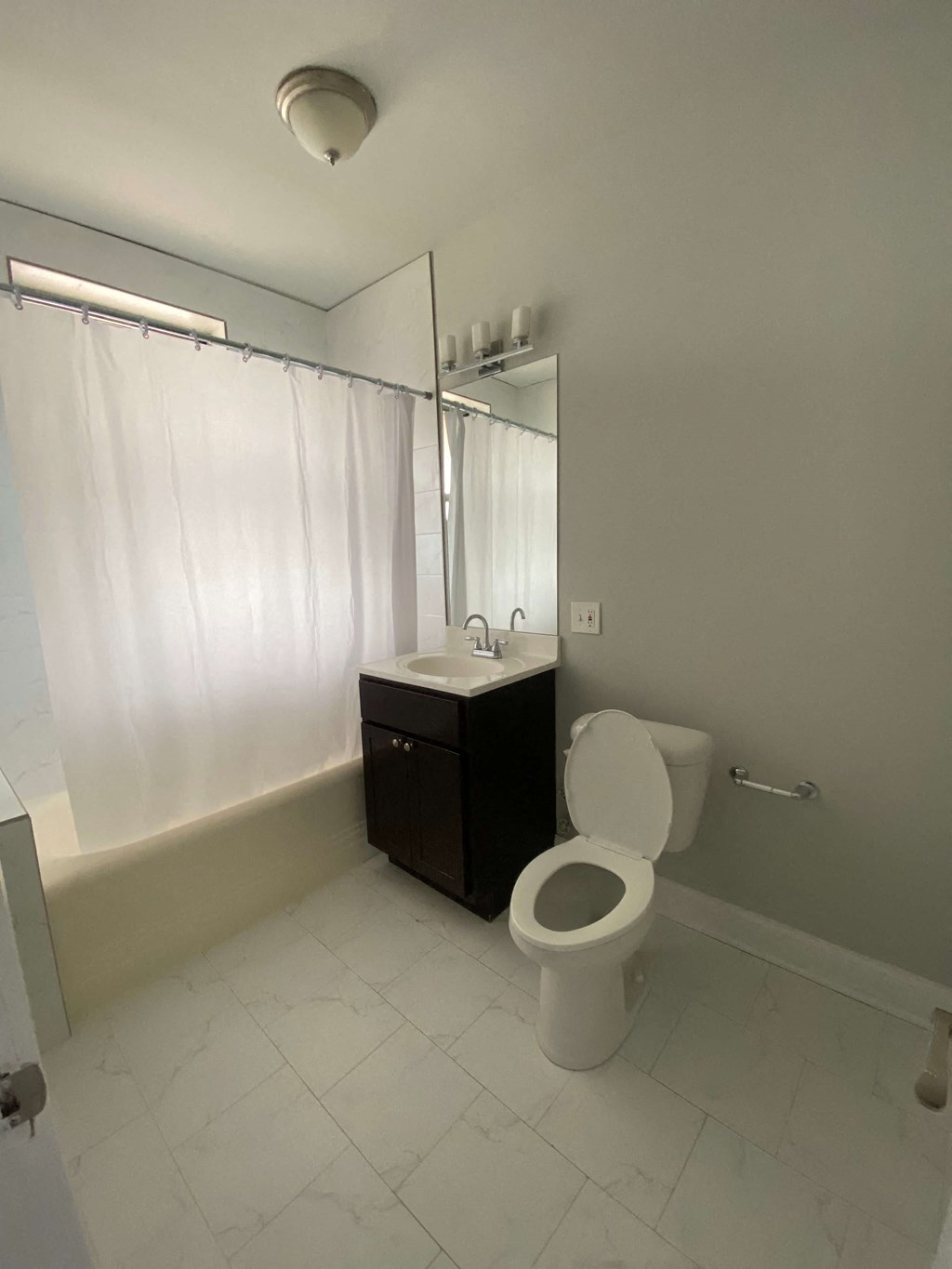 a small bathroom with a toilet and a sink