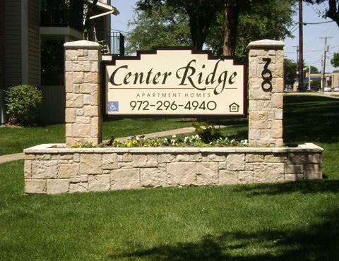 the sign at the entrance to center ridge apartments