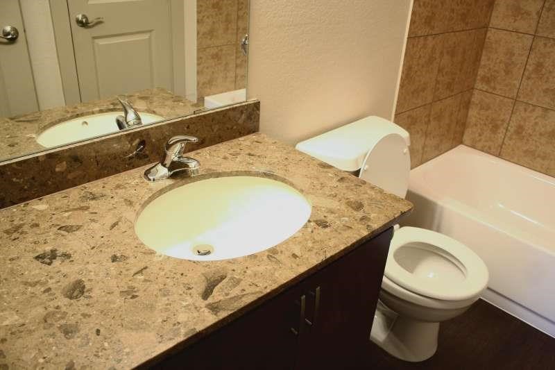 a bathroom with a sink and a toilet