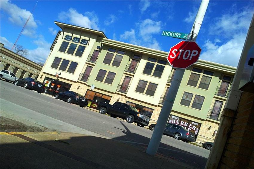 a stop sign in front of a building