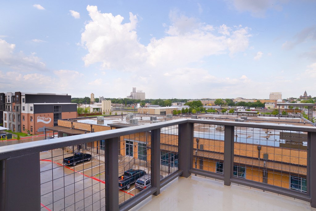 a view of the parking lot from the roof of a building