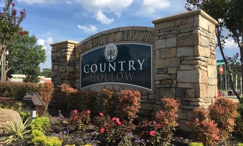 the sign for country hollow at the entrance of the city of country hollow