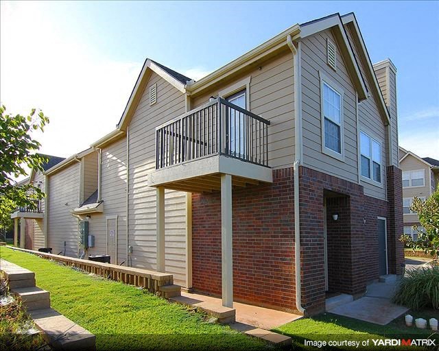 a house with a balcony on the side of it