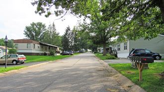a street of mobile homes in a mobile home park