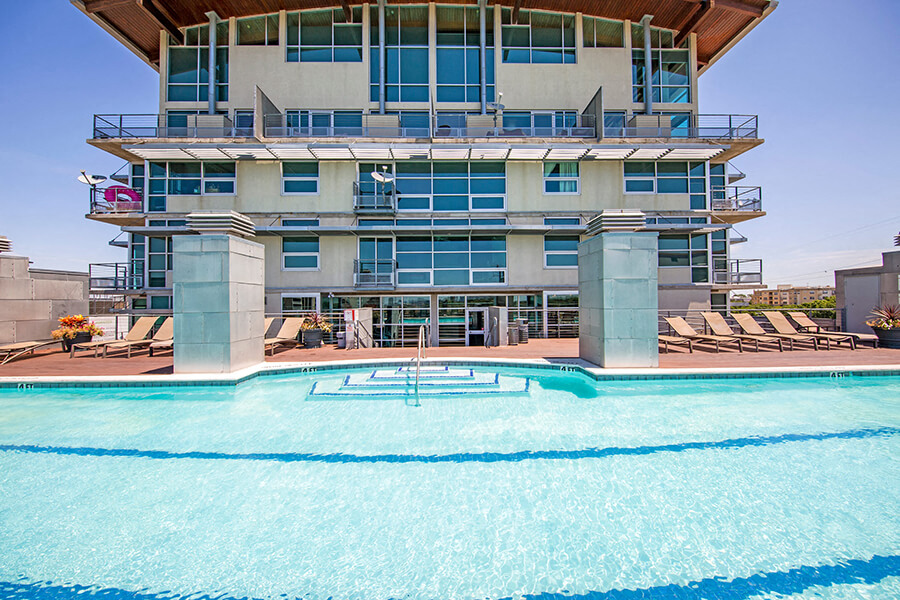 Olympic style swimming pool with sun loungers