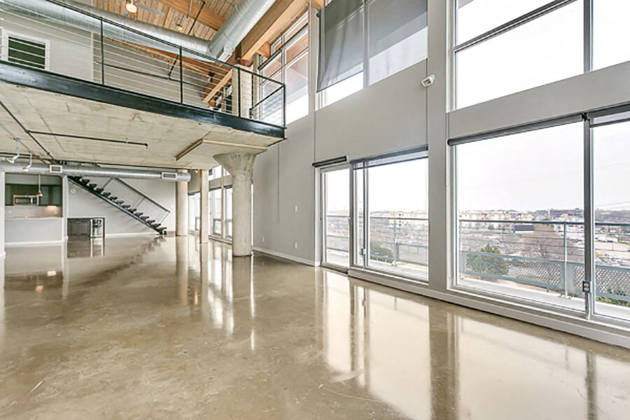 Beautiful modern loft style penthouse with large corner balcony