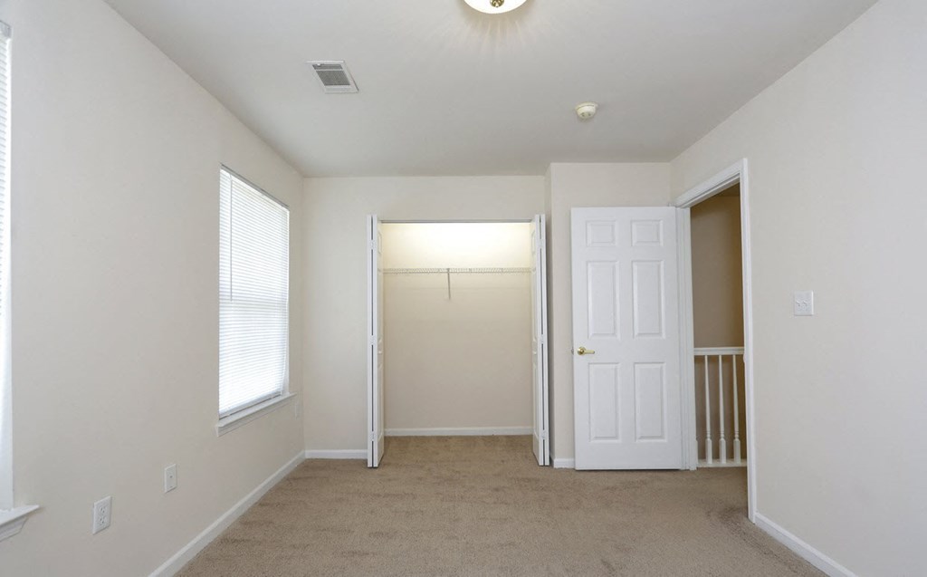 Spacious bedroom at Ashley Midtown in Savannah, Georgia