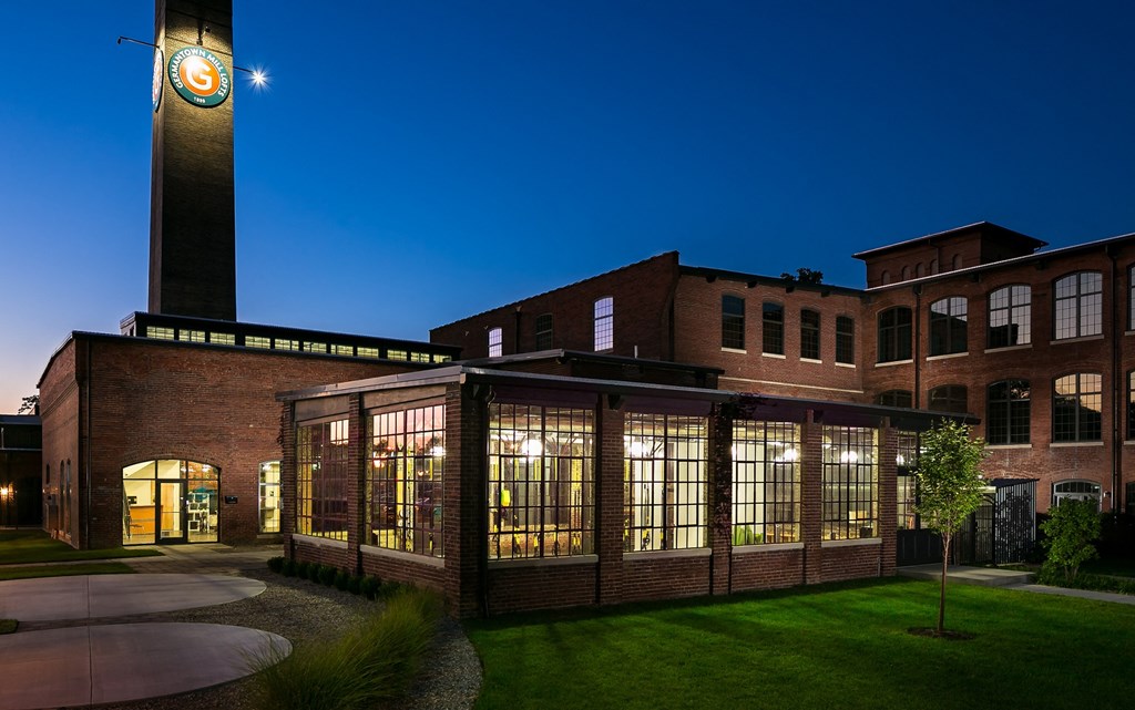 a building with a clock tower at night