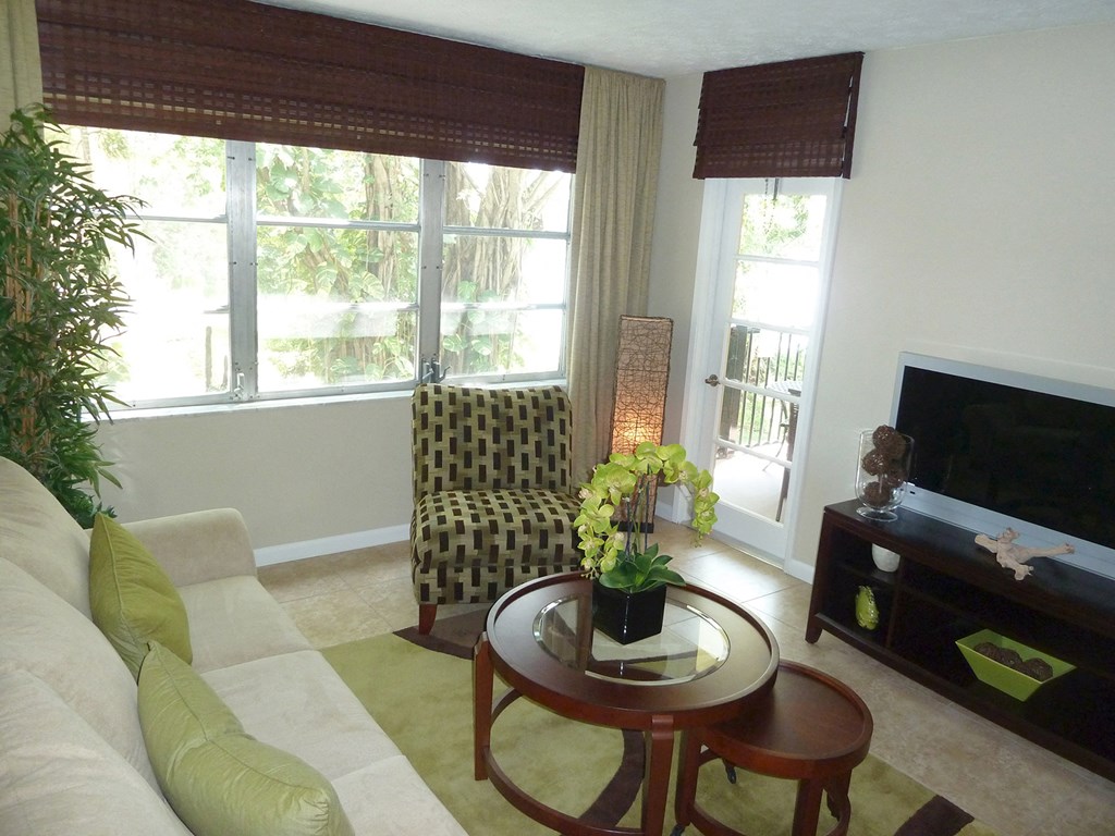 a living room with a couch and a coffee table
