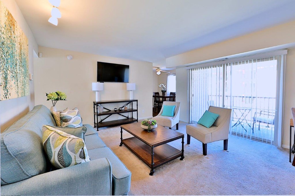 a living room with a couch and a table