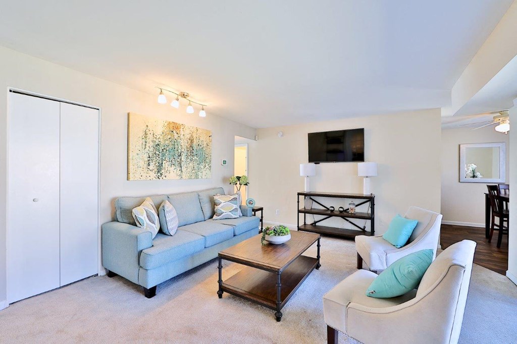 a living room with a couch and a table