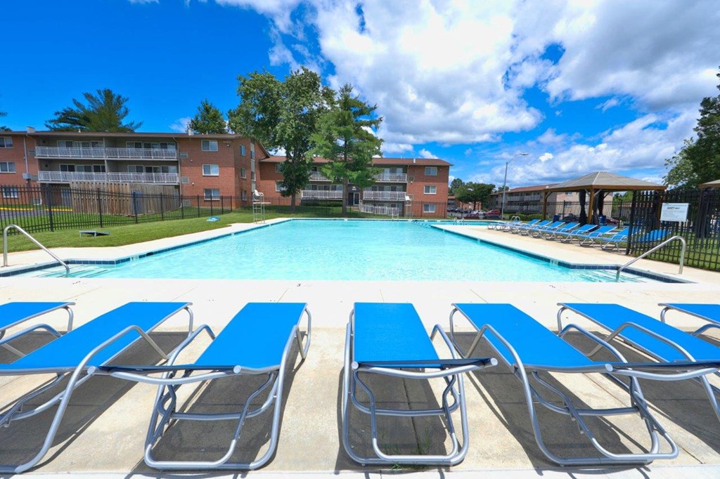 our apartments offer a swimming pool with chaise lounge chairs