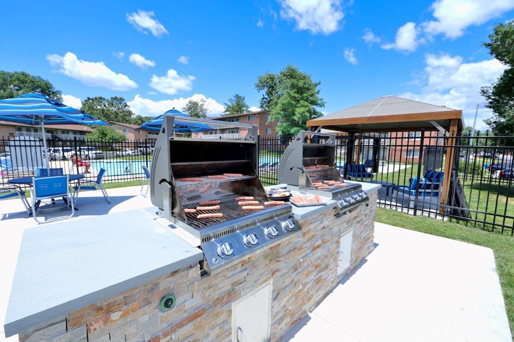 the outdoor grill is available for use by the pool
