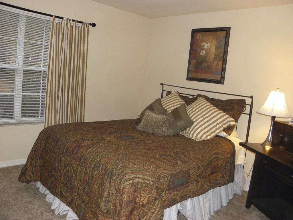 bedroom with bed and desk