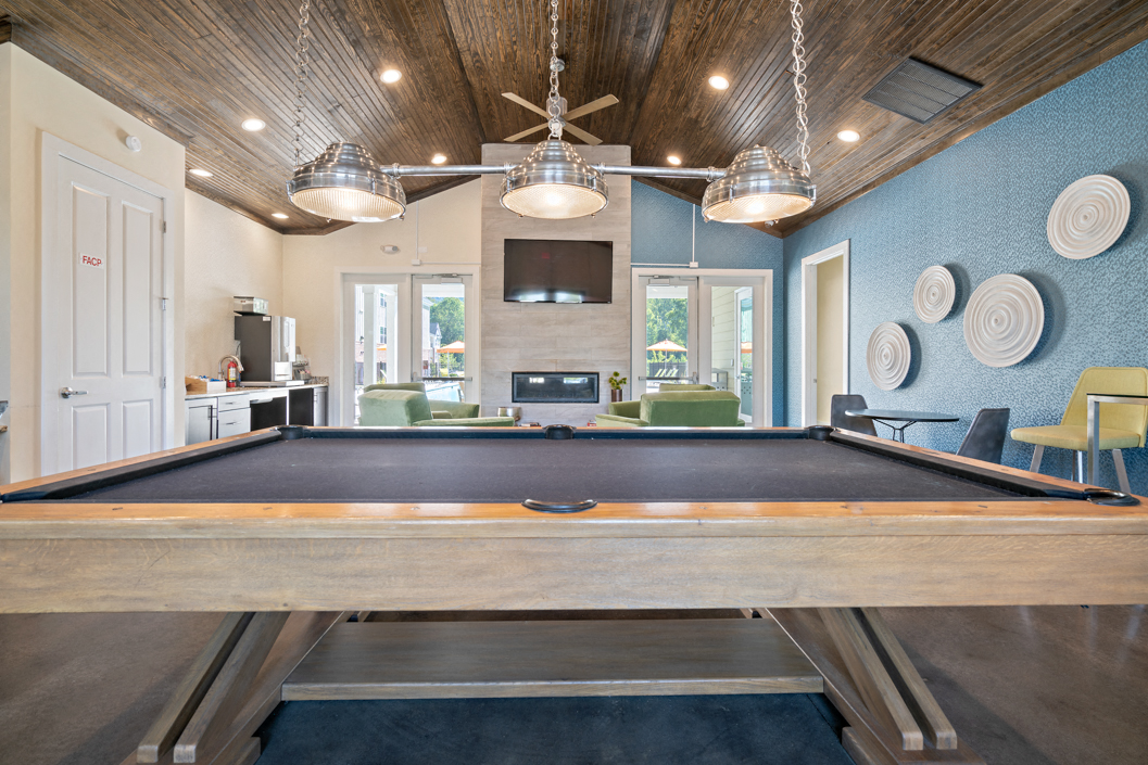Play a game of billiards in the clubhouse at Hawthorne at Southside