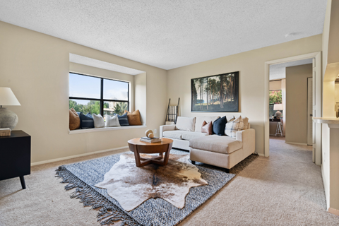 a living room with a couch and a coffee table