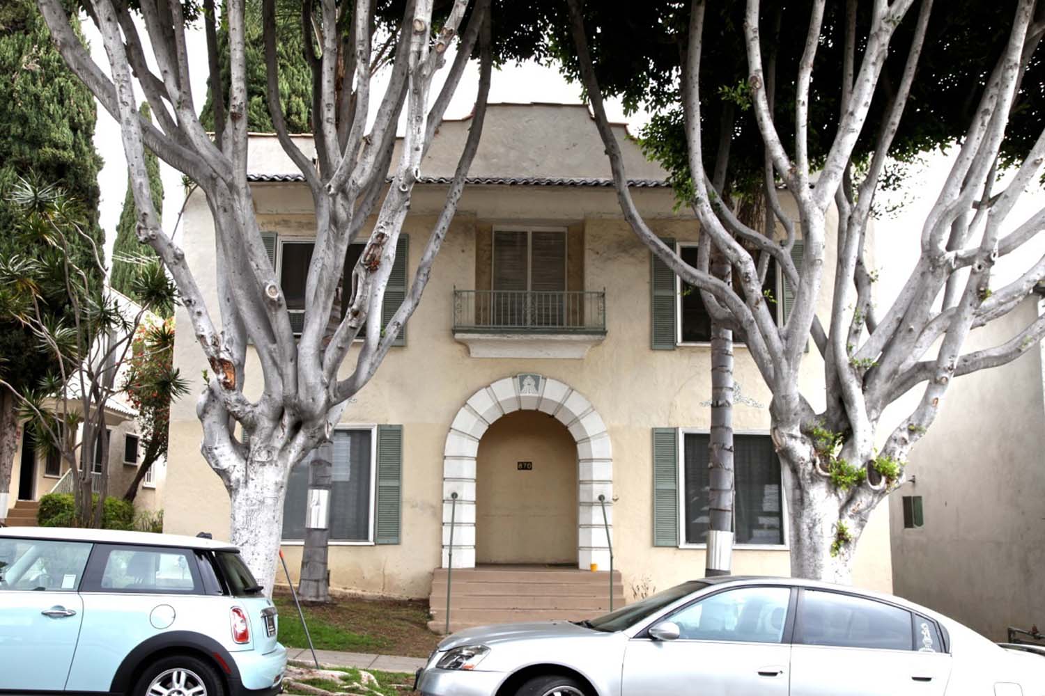 a house with a car parked in front of it