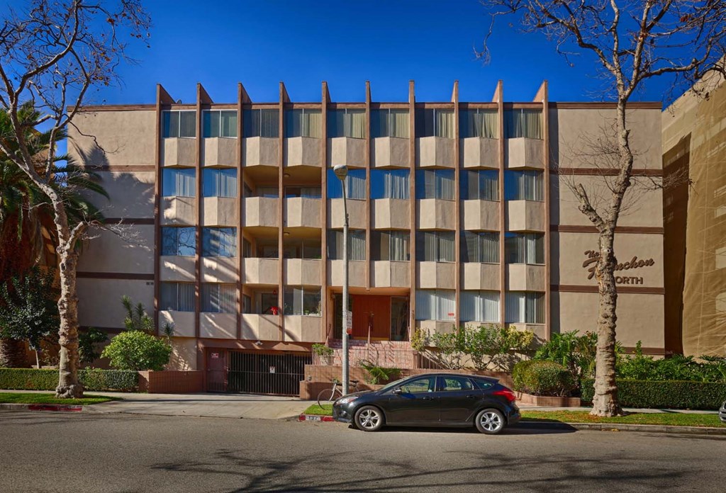 a car parked in front of a building