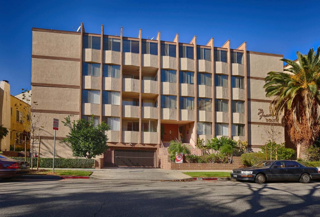 a building with a car parked in front of it