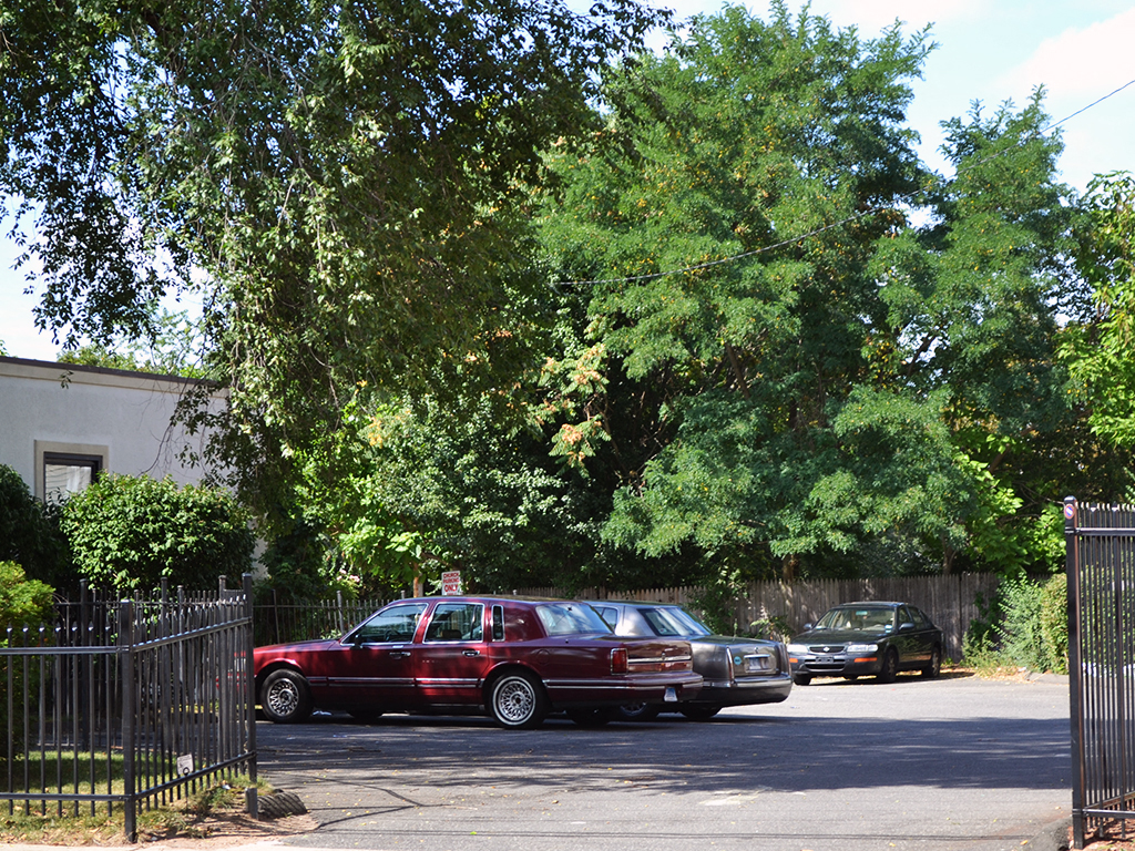 two cars parked in a parking lot