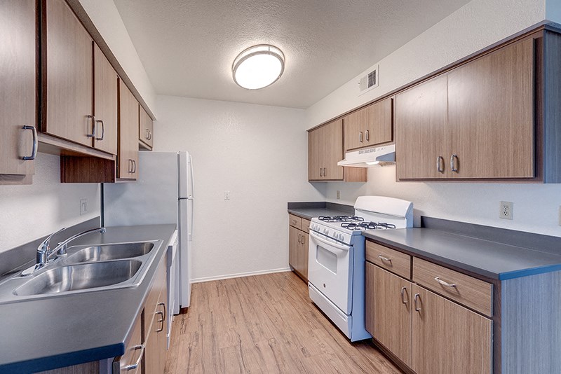 Kitchen with appliances at VINE BY VINTAGE Apartments, Lompoc, CA, 93436