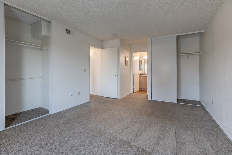 Master Bedroom with two closets at VINE BY VINTAGE Apartments, California, 93436