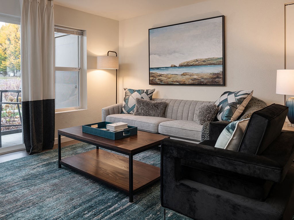 Living Room With Expansive Window at Edgewater Apartments, Boise, ID, 83703