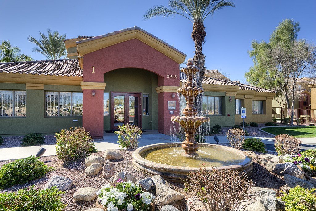 a fountain in front of a building