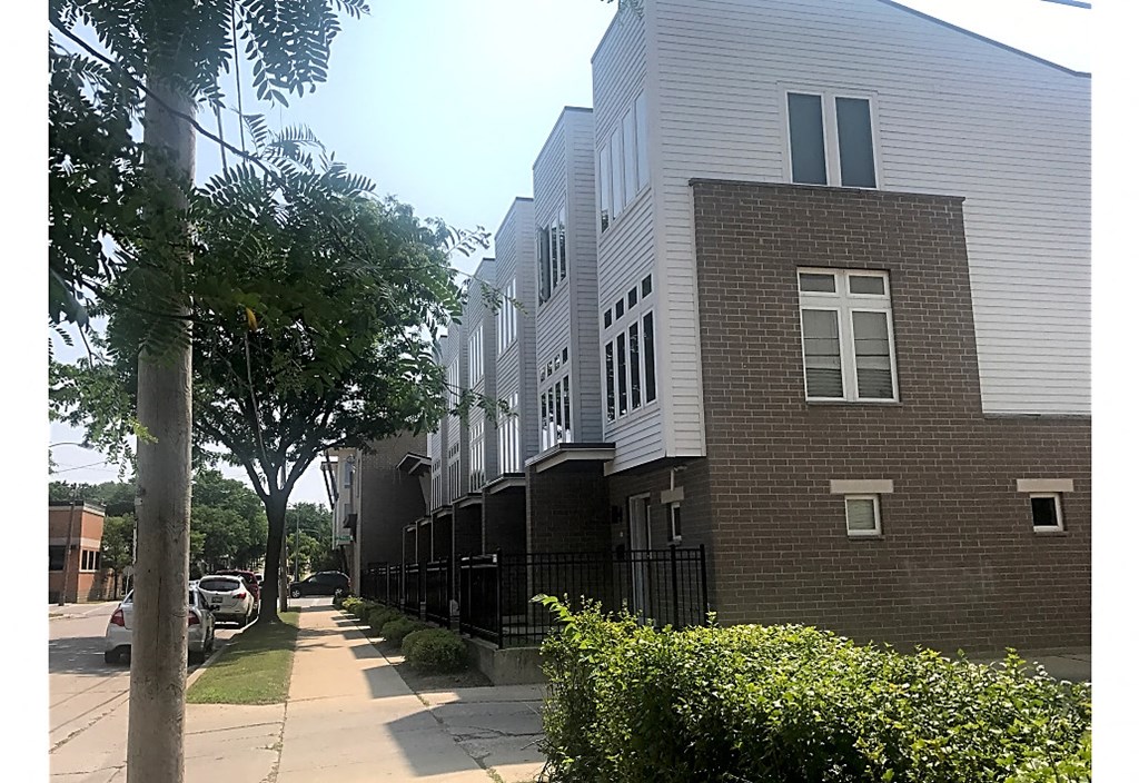 a row of town houses on a city street