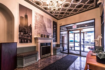 Lobby with Fireplace Lobby with Fireplace at 14 West Elm Apartments, Chicago, 60610` - Photo Gallery 3