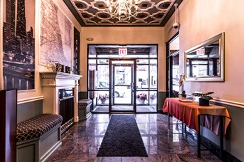 Atrium Style Lobby Atrium Style Lobby at 14 West Elm Apartments, Chicago, IL - Photo Gallery 4