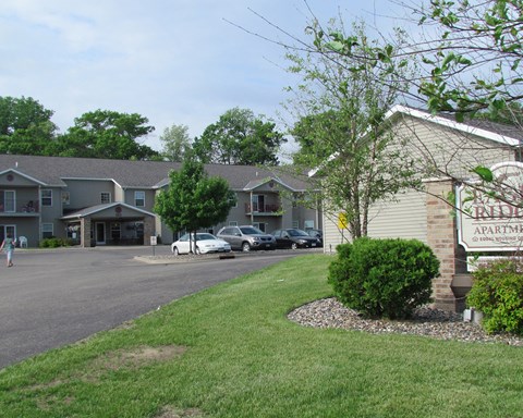a view of the parking lot of the heights apartments
