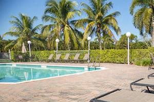 outdoor pool chairs and pool_Westview Gardens Apartments Miami, Florida
