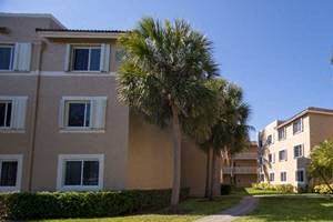 exterior landscape of apartment complex with palm trees_Westview Gardens Apartments Miami, Florida