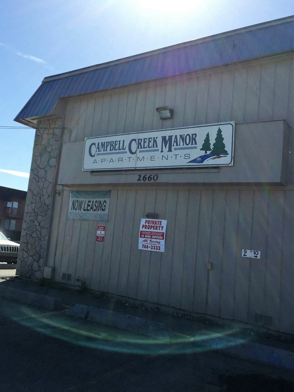 a building with a sign on the side of it