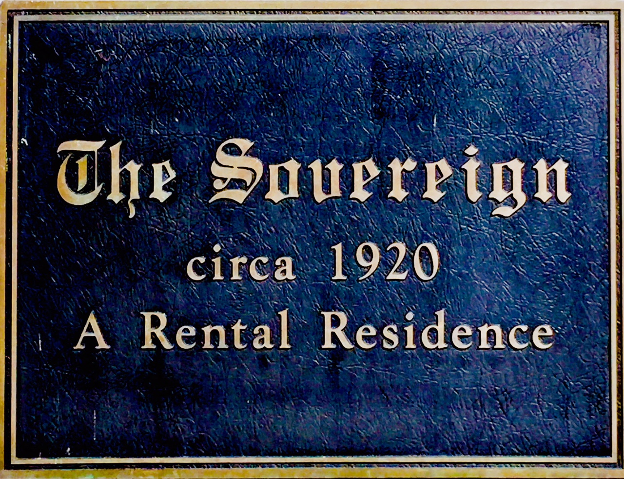 a blue sign with the name of a rental residence